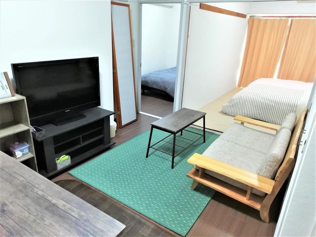 Near Tram Apartment Окаяма Екстериор снимка